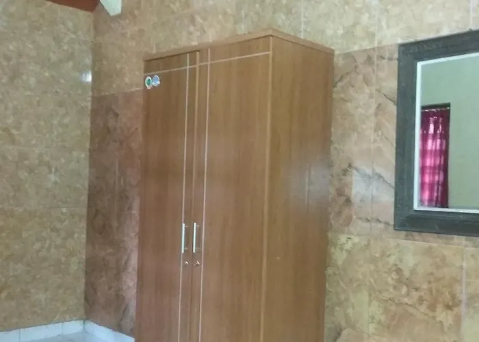 Santun Quarto em Acomodações Particulares